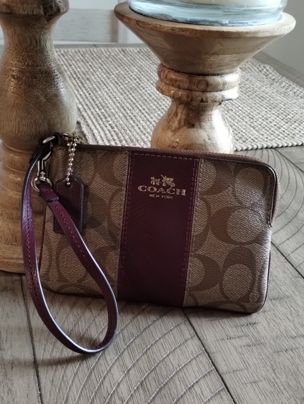 Coach Brown Signature Canvas Wristlet with Plum Trim